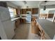 Functional kitchen with natural light, offering potential for modern updates and customization at 1998 Cove Dr, Largo, FL 33774