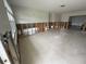 Spacious living room with tile floors, ready for renovation and personal touches to be added at 1998 Cove Dr, Largo, FL 33774
