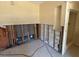 Living room with a view into the renovated bathroom at 411 Shore E Dr, Oldsmar, FL 34677