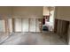 Unfinished room with tile flooring and exposed wall framing at 411 Shore E Dr, Oldsmar, FL 34677