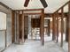 Unfinished bathroom area with a toilet and tub behind wood frame supports at 4200 Huntington Ne St, St Petersburg, FL 33703