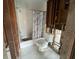 Bathroom featuring an integrated tub and shower, alongside essential fixtures ready to be updated with personal flair at 4200 Huntington Ne St, St Petersburg, FL 33703