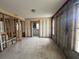 Another view of the open living space, showing an overhead light fixture and multiple windows for natural light at 4200 Huntington Ne St, St Petersburg, FL 33703