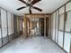 Unfinished room with block walls, wood frame supports, and view into an adjacent room at 4200 Huntington Ne St, St Petersburg, FL 33703