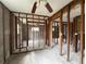 Unfinished room with block walls, wood frame supports, and view into an adjacent room at 4200 Huntington Ne St, St Petersburg, FL 33703