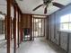 Unfinished room with block walls, wood frame supports, and view into an adjacent room at 4200 Huntington Ne St, St Petersburg, FL 33703