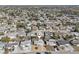 Aerial view of a home in a well-populated neighborhood near a waterfront at 3630 Winder Dr, Holiday, FL 34691