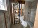 Under-construction bathroom displaying plumbing awaiting finishing touches for a custom design, shower, and fixtures at 4247 Helena Ne St, St Petersburg, FL 33703