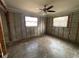 Unfinished bedroom featuring framing construction and natural light from windows, awaiting personalized design and renovation at 4247 Helena Ne St, St Petersburg, FL 33703