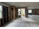 Open-concept living space with a doorway to a backyard, ready for customization at 4247 Helena Ne St, St Petersburg, FL 33703