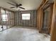 Renovation-ready living room with ceiling fan, primed for your personalized touches at 4247 Helena Ne St, St Petersburg, FL 33703