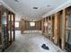 Open-concept living area, ready for restoration with natural light and spacious design at 4247 Helena Ne St, St Petersburg, FL 33703