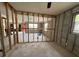 Spacious living area primed for renovation, awaits transformation into a modern space at 4247 Helena Ne St, St Petersburg, FL 33703