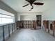 Bright living room with ceiling fan, offering the opportunity for custom upgrades and finishes at 4435 Huntington Ne St, St Petersburg, FL 33703