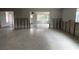 Large, open living space, framed for renovation, with abundant natural light at 4435 Huntington Ne St, St Petersburg, FL 33703