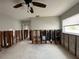 Bright living room with a ceiling fan that presents an exciting canvas for renovation ideas at 4435 Huntington Ne St, St Petersburg, FL 33703