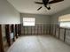Main bedroom featuring large windows and a ceiling fan; customize to create a perfect sanctuary at 4435 Huntington Ne St, St Petersburg, FL 33703