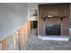 Spacious living room ready for renovation, featuring brick fireplace at 4706 Lansing Ne St, St Petersburg, FL 33703