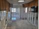 View of a Kitchen with exposed framing ready for renovation and personalization at 6220 Keller Dr, Port Richey, FL 34668