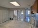 View of a Living Room with exposed framing ready for renovation and personalization at 6220 Keller Dr, Port Richey, FL 34668