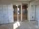 View of a Sun Room with exposed framing ready for renovation and personalization at 6220 Keller Dr, Port Richey, FL 34668
