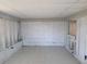 View of a Sun Room with exposed framing ready for renovation and personalization at 6220 Keller Dr, Port Richey, FL 34668
