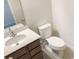Cozy bathroom featuring a single vanity, white toilet, and modern fixtures at 6310 116Th E Ave, Parrish, FL 34219