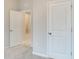 This bedroom features neutral walls, carpeted floors, and an en-suite bathroom and closet at 6310 116Th E Ave, Parrish, FL 34219