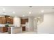Bright and airy kitchen featuring modern appliances, granite countertops, and ample cabinet space at 6310 116Th E Ave, Parrish, FL 34219