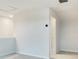 Bright loft with neutral color palette and carpet flooring, next to doorframe at 6310 116Th E Ave, Parrish, FL 34219
