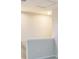 Upstairs landing area has neutral-colored walls with a painted white banister on the stairway at 6310 116Th E Ave, Parrish, FL 34219