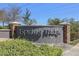 The Spring Ridge Deed Restricted Community entrance sign with manicured landscaping at 9628 Southern Charm Cir, Brooksville, FL 34613