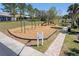 The neighborhood playground includes swings, a slide, and a picnic area for Gathering fun at 9628 Southern Charm Cir, Brooksville, FL 34613