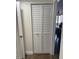 Louvered closet doors in hallway at 4780 Brittany S Dr # 111, St Petersburg, FL 33715