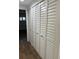 Hallway features large louvered closets at 4780 Brittany S Dr # 111, St Petersburg, FL 33715