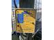 Close-up of a GEM Remotes control box with detailed operating instructions for boat lift operation at 4780 Brittany S Dr # 111, St Petersburg, FL 33715