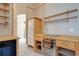Kitchen featuring custom wooden cabinets and oven and stove at 7622 Hampshire Garden Pl, Apollo Beach, FL 33572