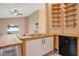 Open concept kitchen with custom wooden island sink and dishwasher at 7622 Hampshire Garden Pl, Apollo Beach, FL 33572