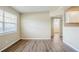 Large living room with new laminate floors and plenty of light at 1542 39 S St, St Petersburg, FL 33711