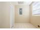 A utility room with a storage closet and an electrical panel at 1542 39 S St, St Petersburg, FL 33711