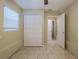 Bedroom with tile floor, closet, and large window at 2011 10Th S St, St Petersburg, FL 33705
