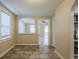 Dining area featuring tiled floors, ample natural light and an arched pass-through to the kitchen at 2011 10Th S St, St Petersburg, FL 33705