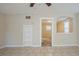 This open-concept living room offers neutral walls, tiled floors, and recessed wall shelves at 2011 10Th S St, St Petersburg, FL 33705