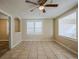 Bright living room features neutral walls, tiled floors, and ample natural light at 2011 10Th S St, St Petersburg, FL 33705