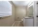 Bathroom featuring a vanity with granite countertop and tile flooring at 3207 N 45Th St, Tampa, FL 33605
