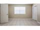 Neutral bedroom with window letting in light and doorway at 3207 N 45Th St, Tampa, FL 33605