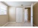 Bedroom featuring a closet, tile flooring and natural light from a window at 3207 N 45Th St, Tampa, FL 33605