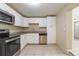 Modern kitchen featuring stainless steel appliances and ample counter space at 3207 N 45Th St, Tampa, FL 33605