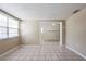 Spacious room showcasing the neutral interior and tile floors at 3207 N 45Th St, Tampa, FL 33605