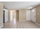 Spacious room showcasing the neutral interior and tile floors at 3207 N 45Th St, Tampa, FL 33605